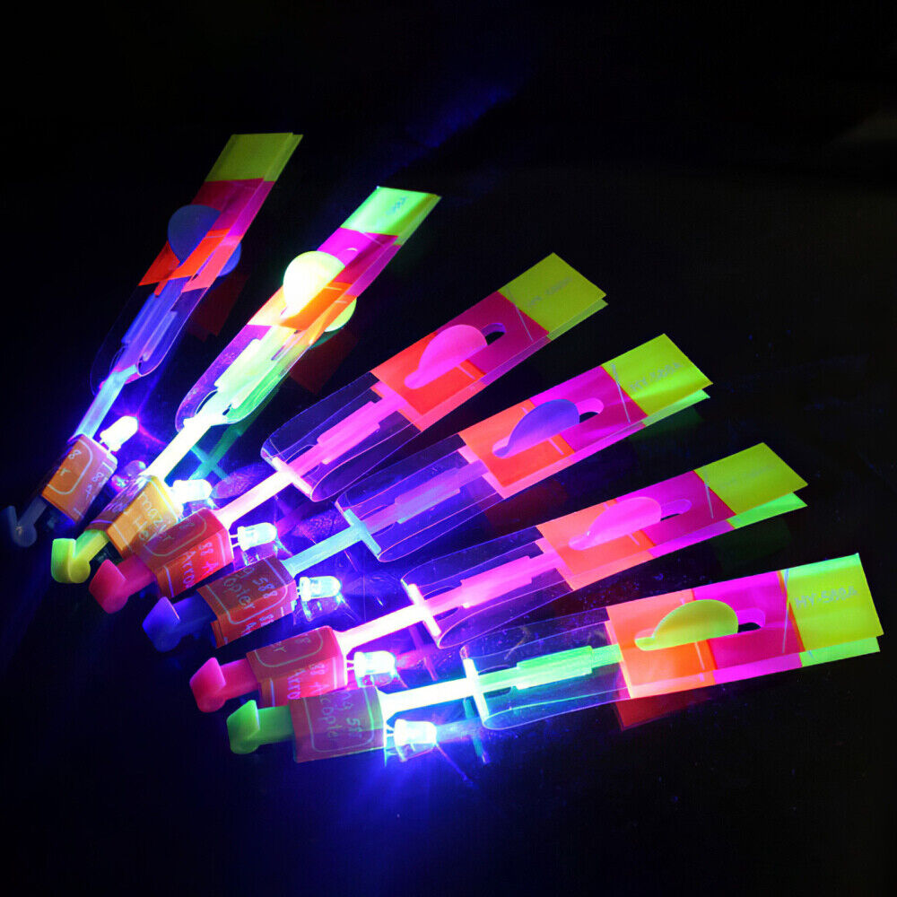 10 Slingshot Arrow Copters LED Light Helicopter Flying Elastic For Kids Toy Gift