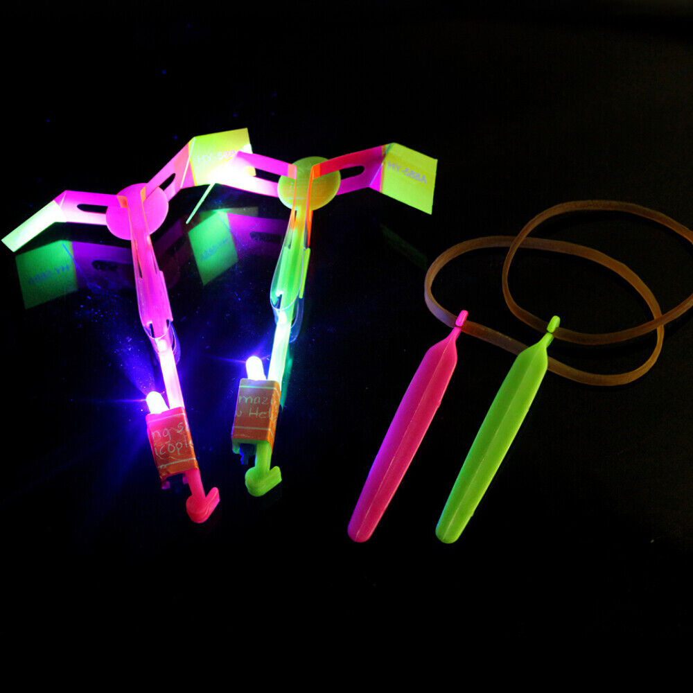 10 Slingshot Arrow Copters LED Light Helicopter Flying Elastic For Kids Toy Gift